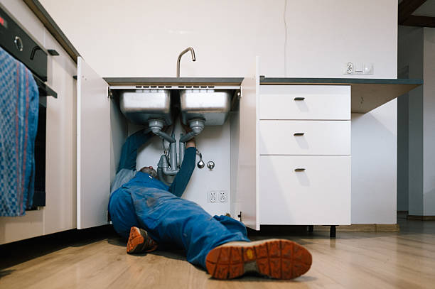 Professional Plumbing technician working in Ford, WA